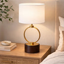 Front view of the 21-inch Nordic circular metal table lamp on a modern wooden desk