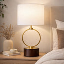 Angled perspective showcasing the striking 21-inch profile of the circular table lamp