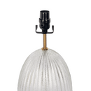 Tall table lamp showcasing its classic white linen drum shade
