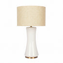 Cascade glass lamp casting a soft, inviting ambient light over a cozy reading corner