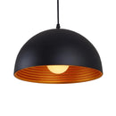 Warm, reflective illumination bouncing off the inner gold aluminum surface of the pendant lamp