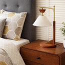 Angled view showcasing the classic mid-century modern design of the table lamp