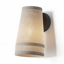 Angled perspective showcasing the imperfect, natural aesthetic of the wabi-sabi wall fixture
