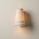 Soft, diffused warm light casting a peaceful, calming glow across a neutral living room wall