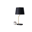 High-quality white fabric shade of the modern desk lamp filtering warm ambient light