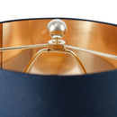 Modern 110V desk lamp placed elegantly on a contemporary bedroom nightstand