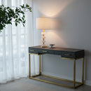 Front view of the 26-inch white and gold marble table lamp on a modern living room side table