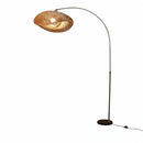 Designer standing lamp seamlessly blending into a contemporary minimalist interior