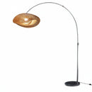 Unboxed modern button-controlled floor lamp during assembly in an apartment