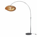 Decorative metal shade casting stylish downward illumination on a side table
