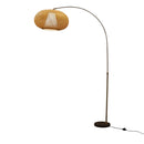 Stylish arc floor lamp paired with a contemporary designer armchair