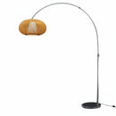 Elegant floor light reflecting soft illumination off living room walls