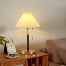 Floor lamp emitting a bright, cool white light ideal for focused reading or working
