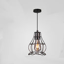 Retro iron chandelier casting intricate geometric shadows against an exposed brick wall
