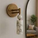 Front view of the retro LED natural marble wall sconce mounted on a textured accent wall