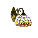 Front view of the Tiffany-style European crystal wall sconce with 20cm stained glass lampshade mounted on a classic living room wall