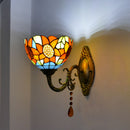 Classic vintage wall sconce providing decorative accent lighting for a traditional study