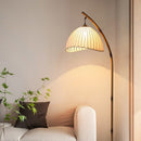 Soft ambient light diffusing from the wabi-sabi floor fixture during a quiet evening
