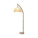 Artistic floor atmosphere lamp serving as a sculptural statement piece in a modern study