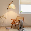 220V wabi-sabi floor lamp illuminating a quiet reading corner with a gentle, grounding glow